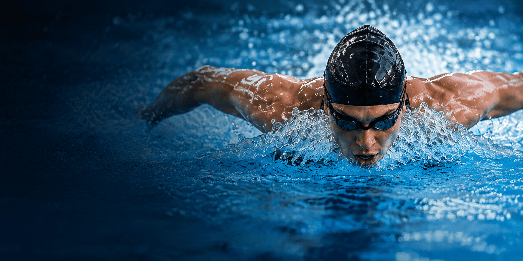 Competitive swimmer performing butterfly